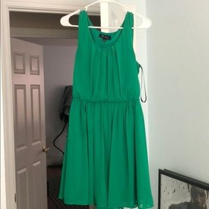 Pleated, flowy, spring/summer dress.